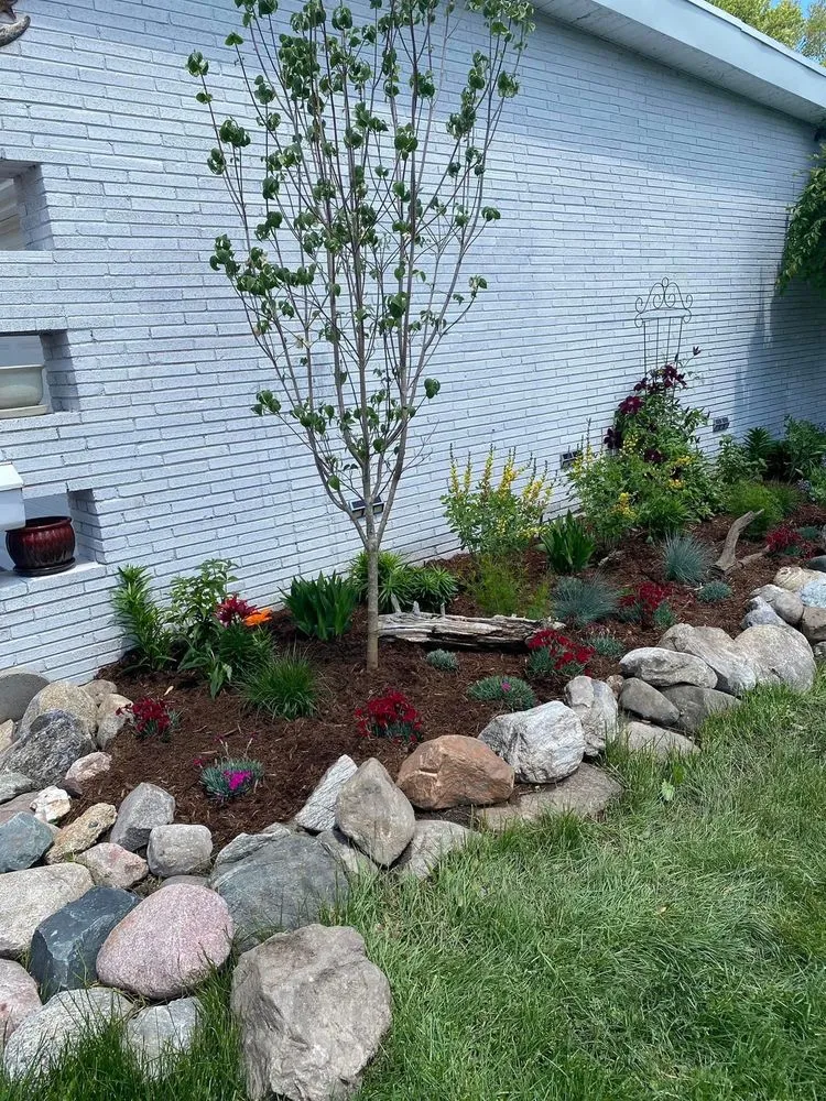 Custom landscape installation with custom design across St Claire Shores, MI - Capek's Landscaping