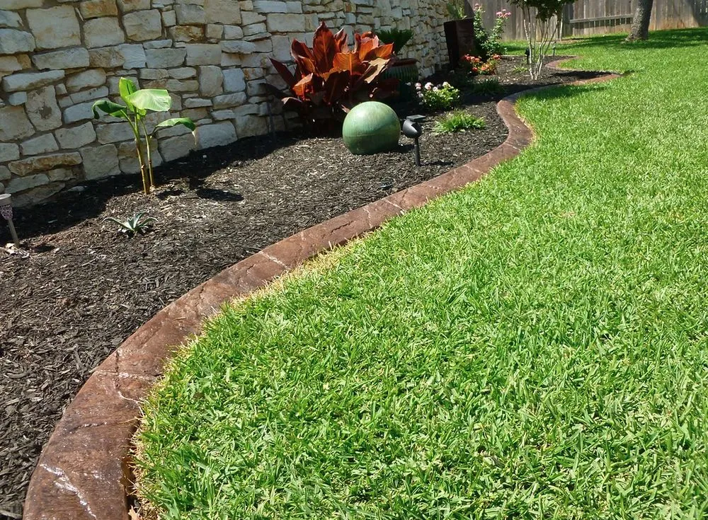 Professional lawn mowing service for beautiful yards in Austin, TX by Capital Curbing