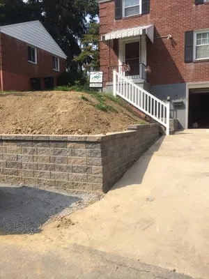 Caprino Landscaping & Excavating Logo