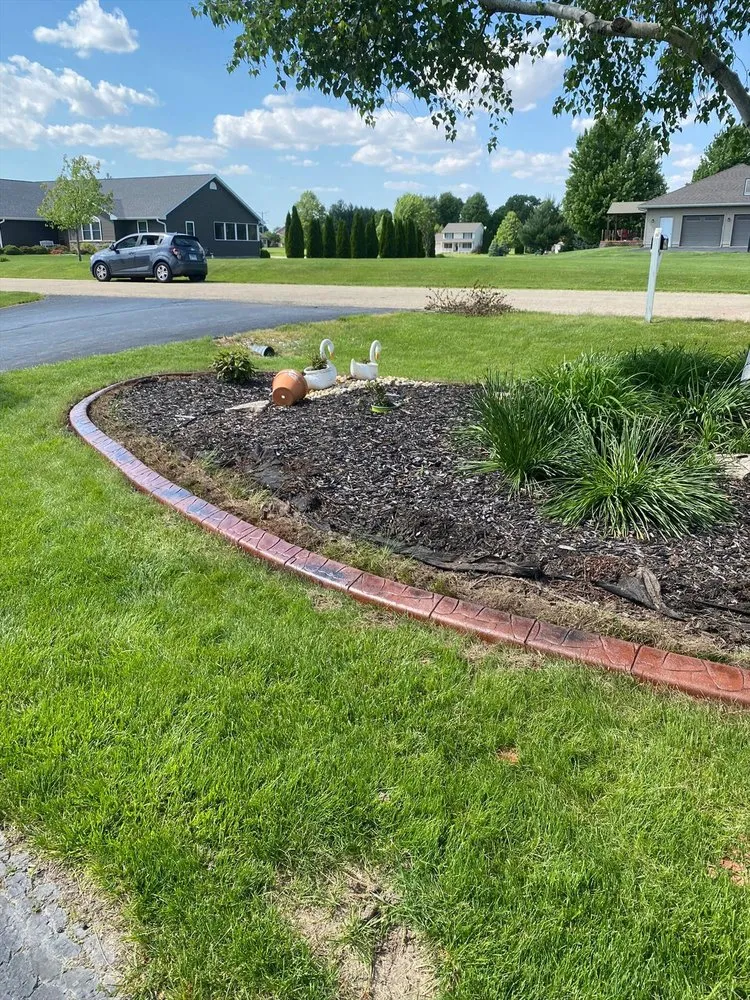 Custom landscape installation for outdoor upgrades across Freeport, IL - Captain Curbing