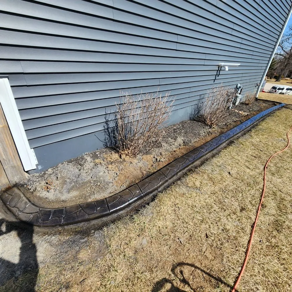 Affordable yard cleanup service with custom design across Freeport, IL - Captain Curbing