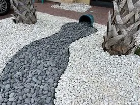 Professional yard cleanup service with custom design in Kissimmee, FL by Captain Jacks Landscaping