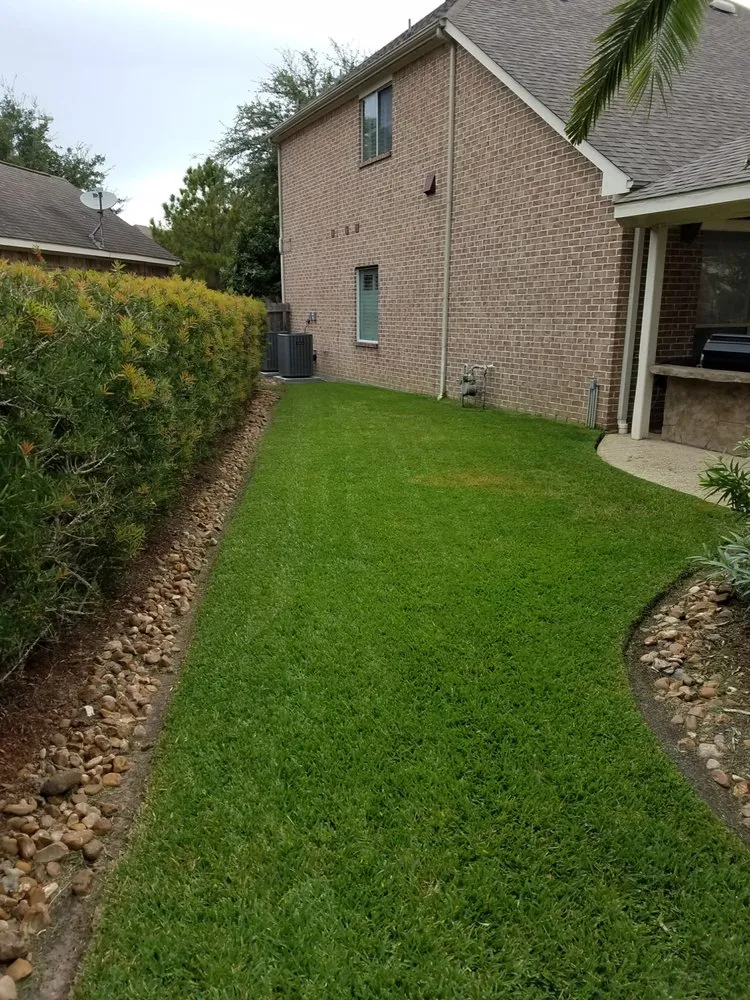 Affordable landscape design with custom design in Katy, TX by Cardinal Landscape Management