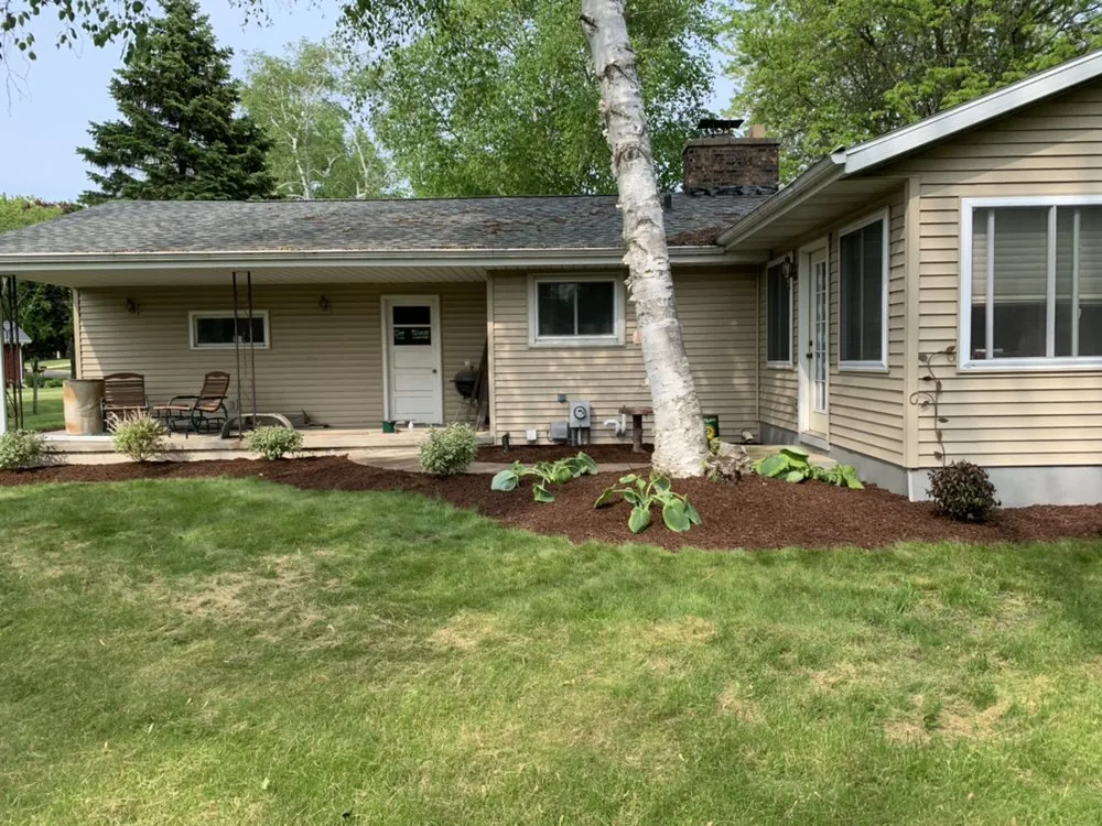 Trusted lawn mowing service with custom design across Oconomowoc, WI - Cardinal Landscaping