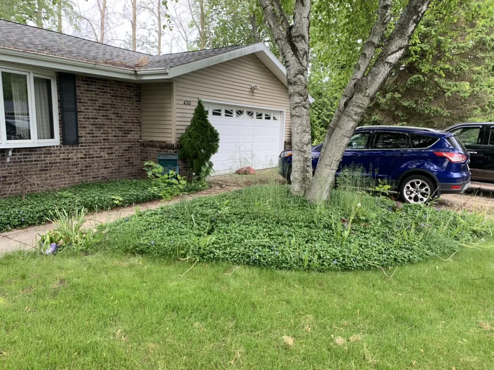 Affordable lawn mowing service with custom design across Oconomowoc, WI - Cardinal Landscaping