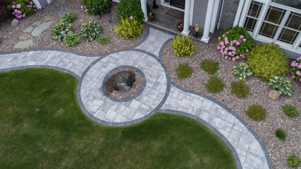 Custom landscaping services for residential properties in Spencerport, NY by Cardinal Lawn & Landscape