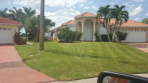 Expert yard maintenance in Cape Coral, FL by Caridad Lawn Service