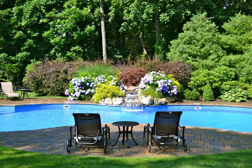 Custom garden landscaping for beautiful yards in East Setauket, NY by Carl Bongiorno & Sons