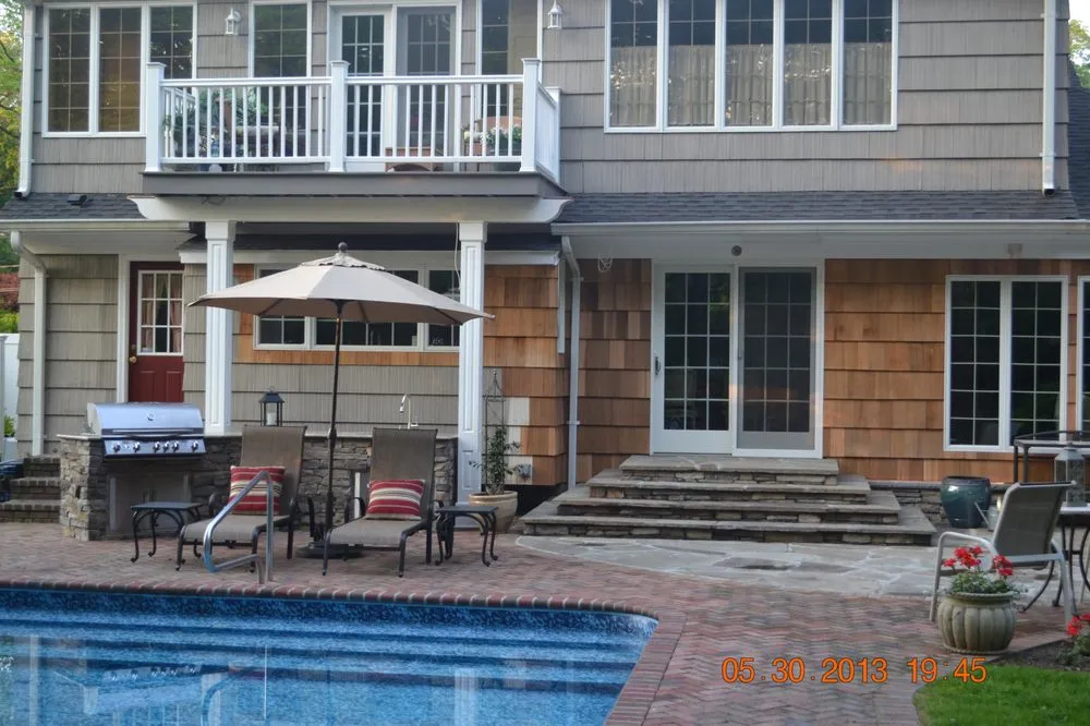 Reliable lawn care service for homes in East Setauket, NY by Carl Bongiorno & Sons