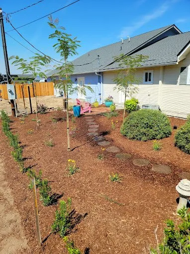 Custom landscape installation in Jacksonville, OR by Carleton & Sons Landscaping