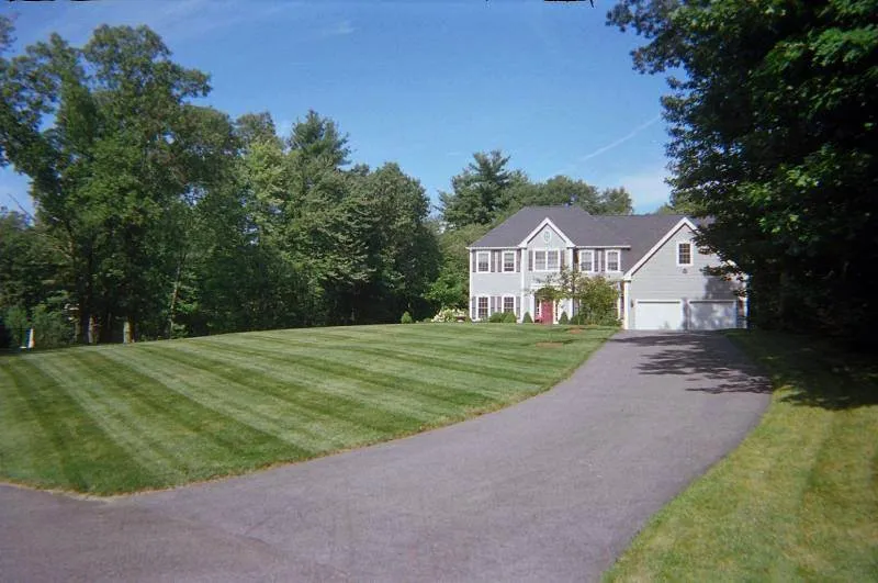 Trusted lawn mowing service for year-round maintenance across Uxbridge, MA - Carlino Landscaping