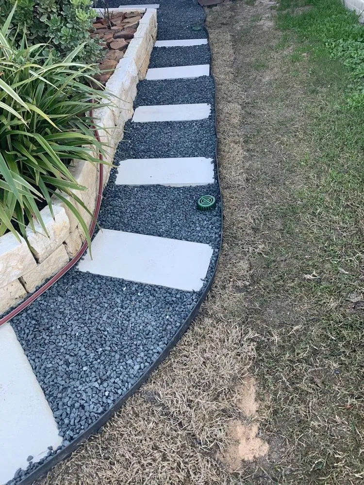 Affordable landscaping services for year-round maintenance in Houston, TX by Carlos landscaping