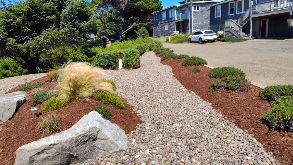 Professional lawn mowing service for residential properties across Newport, OR - Carlos Landscaping