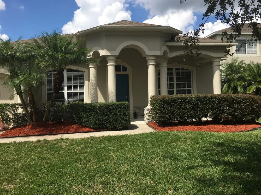 Custom residential landscaping for beautiful yards across Orlando, FL - Carlos Lawn Care Services