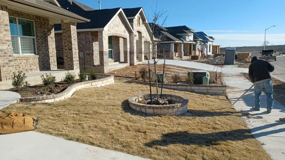 Expert landscape installation for beautiful yards in Austin, TX by Carl's Lawn Services