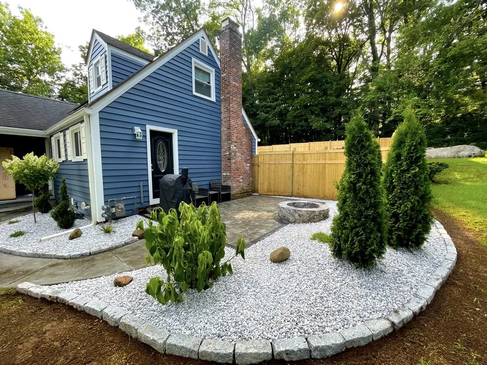 Professional yard maintenance for residential properties in Bolton, CT by Carlson Crafted