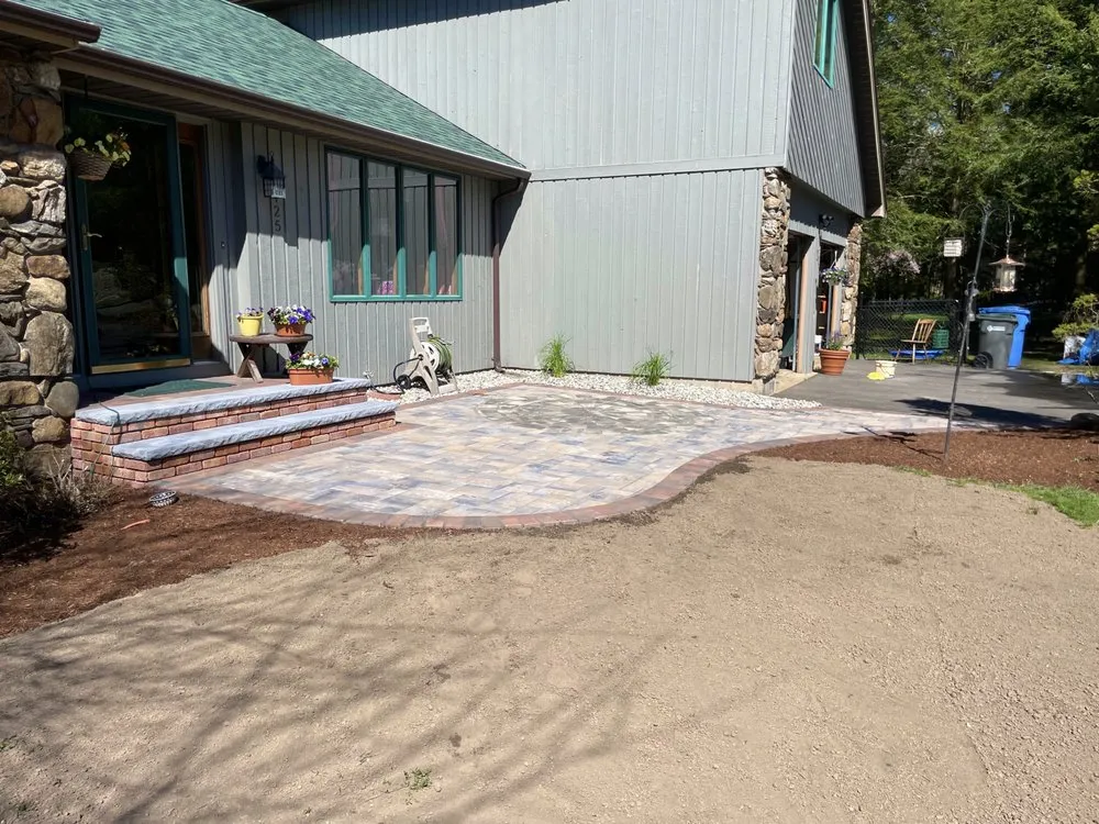 Affordable lawn care service for year-round maintenance across Bolton, CT - Carlson Crafted