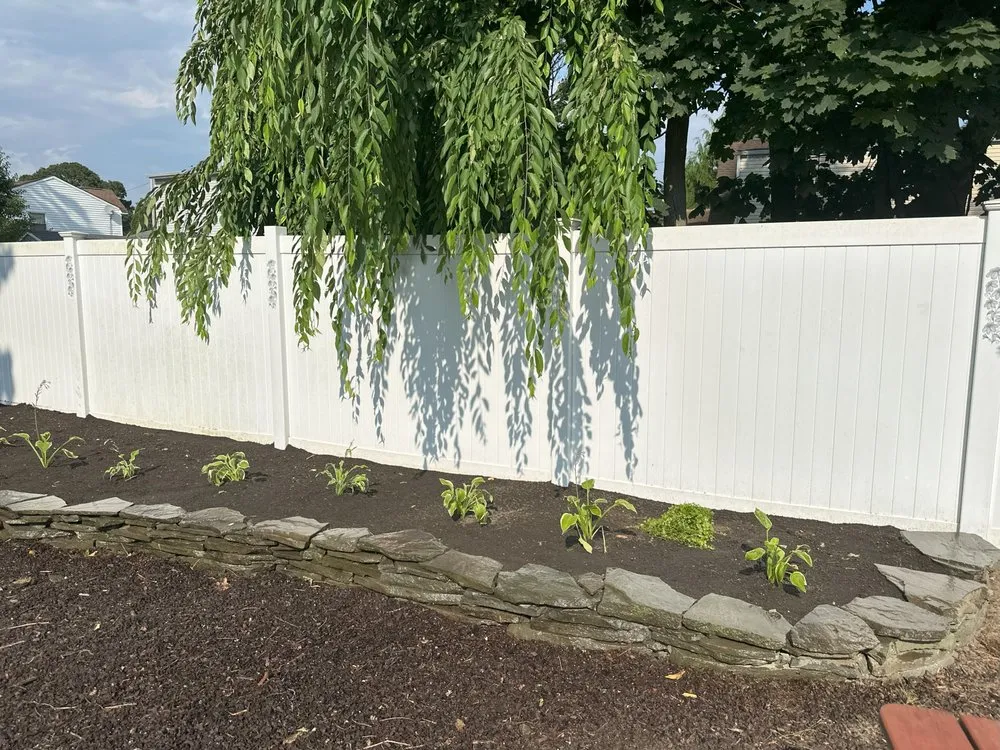 Top-rated yard maintenance for year-round maintenance in Ridge, NY by Carman Landscaping