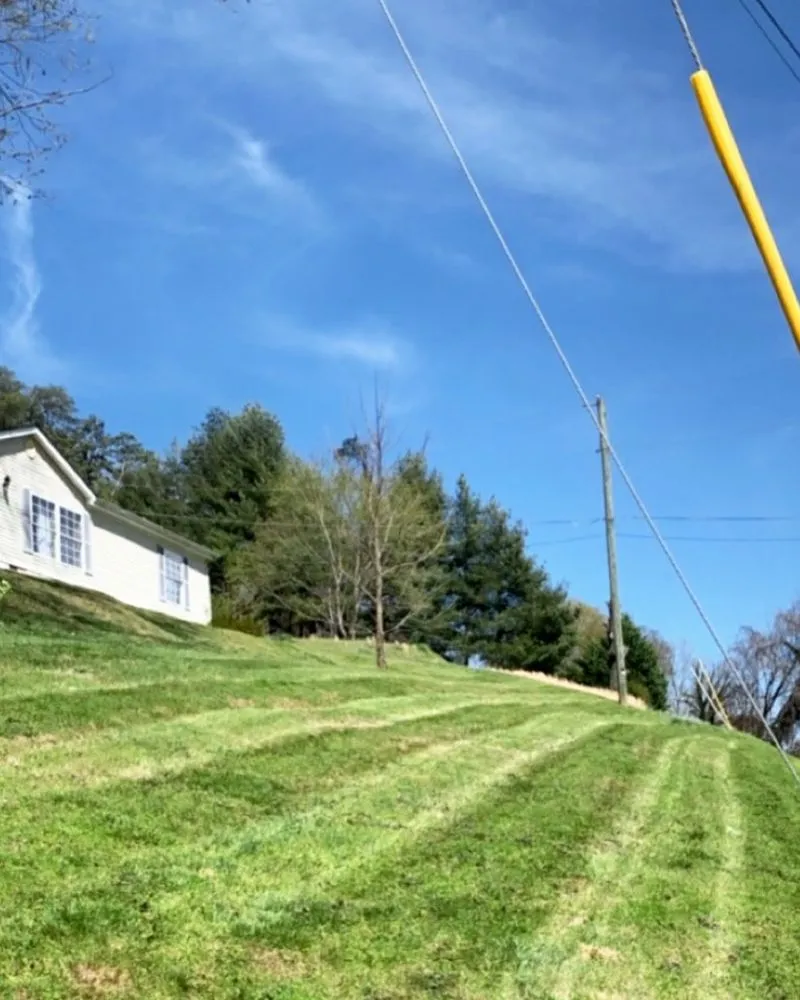 Affordable lawn mowing service for outdoor upgrades in Knoxville, TN by Carmichael’s Lawn Care