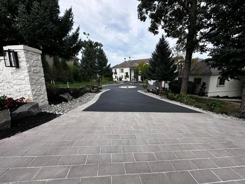 Reliable lawn mowing service for year-round maintenance in Lee's Summit, MO by Carmona Landscape