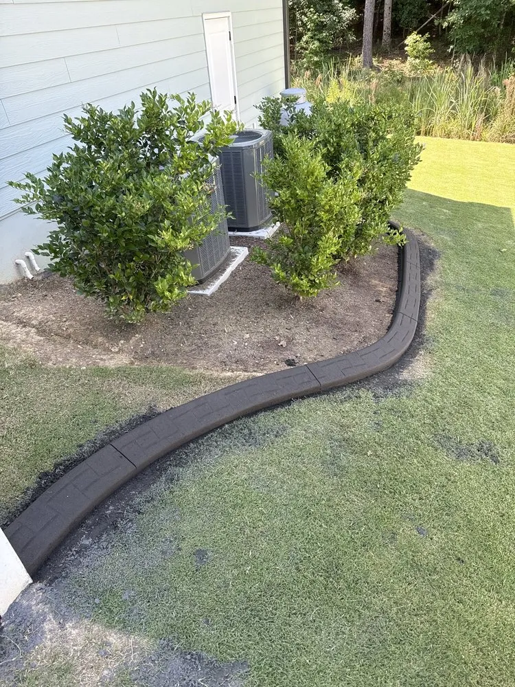 Expert lawn mowing service with custom design across Fuquay Varina, NC - Carolina Custom Curbing