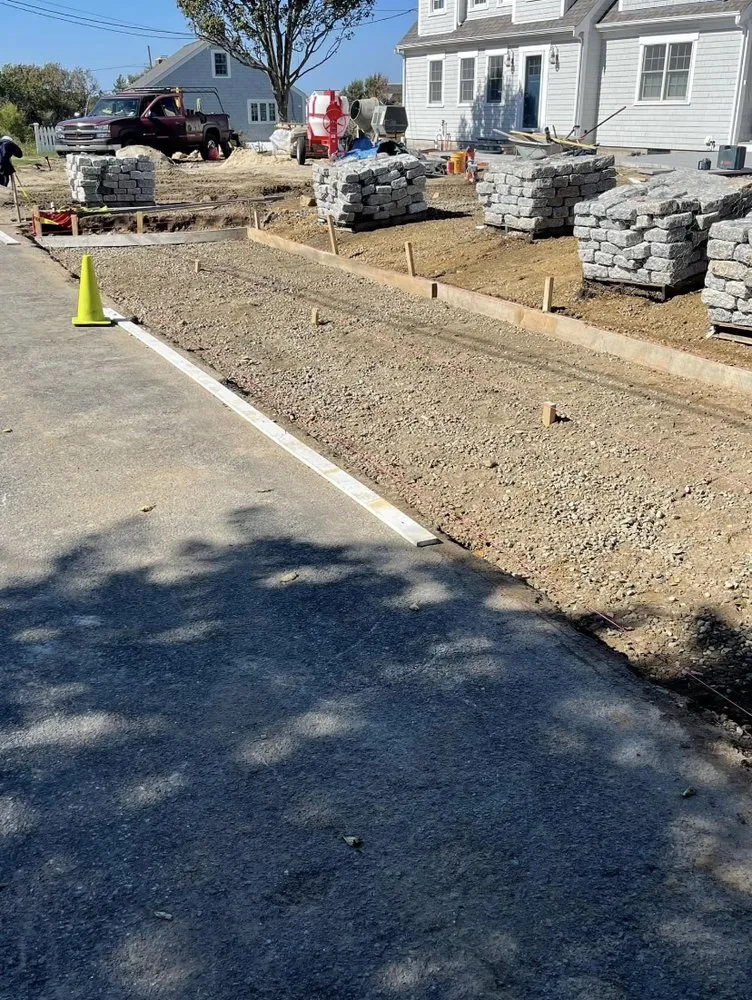 Professional yard cleanup service for year-round maintenance in Fayetteville, NC by Carolina landscap hard scape concrete