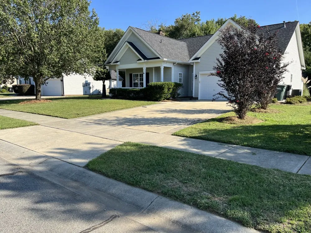 Custom garden landscaping with custom design in Concord, NC by Carolina Lawn Enhancement