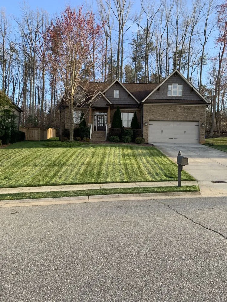 Professional yard cleanup service in Kernersville, NC by Carolina Mowing Concepts
