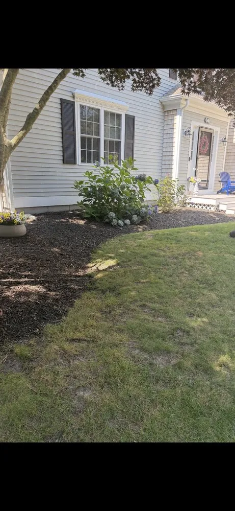 Expert yard maintenance for year-round maintenance across East Falmouth, MA - Carpenter Concrete Curbing