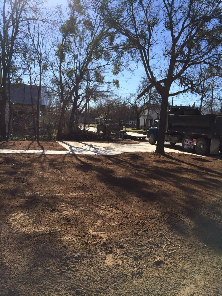 Custom landscape installation with custom design in Stephenville, TX by Carpenter Dirt Work