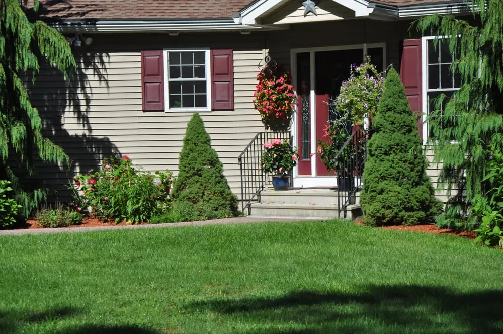 Top-rated garden landscaping with custom design in Acton, MA by Carrier's Turf Pros Lawn Care