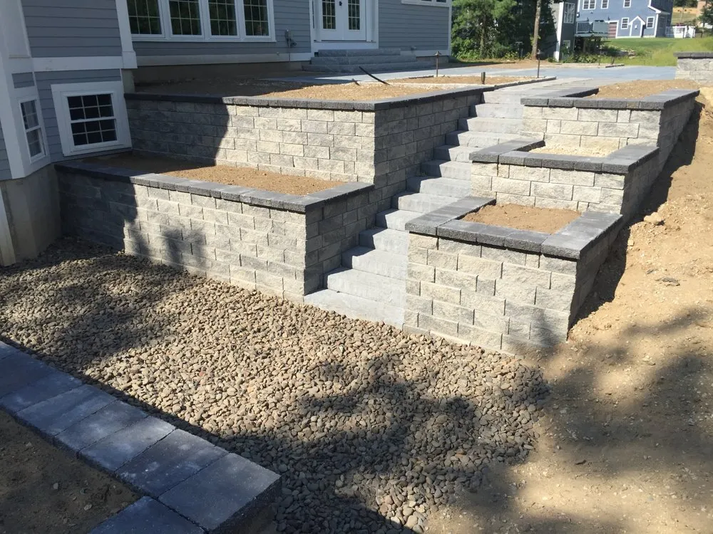 Expert landscape installation with custom design in Hudson, NH by Carroll Landscape & Irrigation