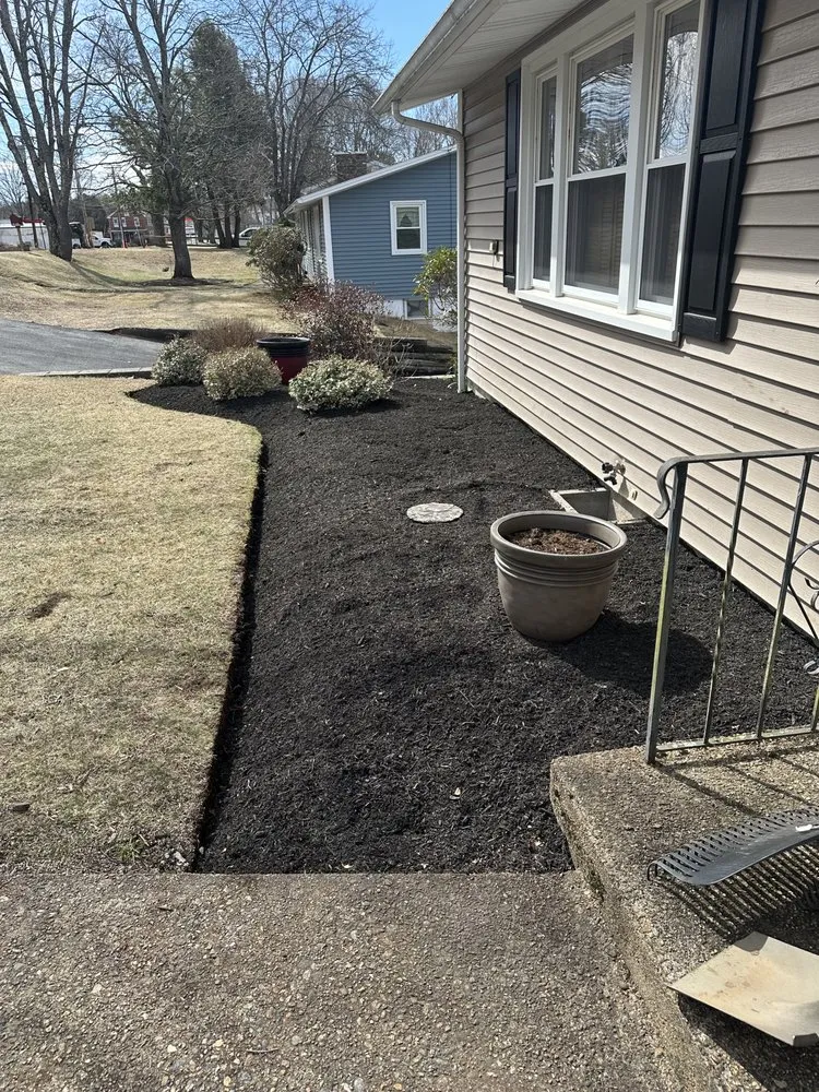 Affordable outdoor landscaping for year-round maintenance across Sturbridge, MA - Carr's Lawn Care Services