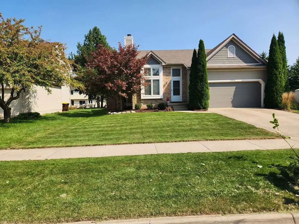 Trusted lawn care service in Lansing, MI by Carter and Sons Lawn Care