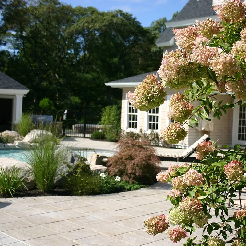 Expert garden landscaping with custom design in Braintree, MA by Caruso Landscape Design