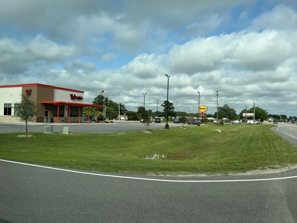 Expert landscaping services for residential properties in Wallace, NC by Casteen Property Maintenance