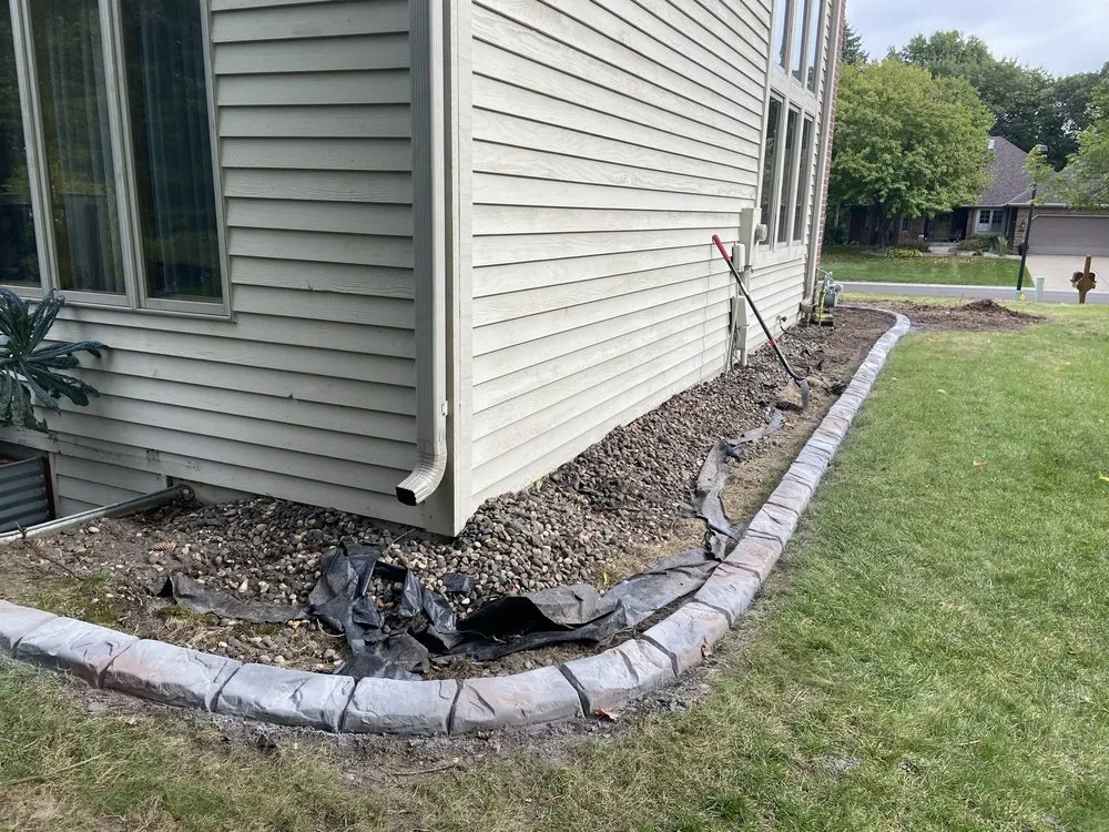 Custom lawn mowing service with custom design in Minneapolis, MN by Castell Construction