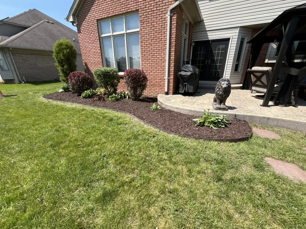 Custom outdoor landscaping with custom design across Charter Township of Clinton, MI - Castillero Lawn And Landscaping
