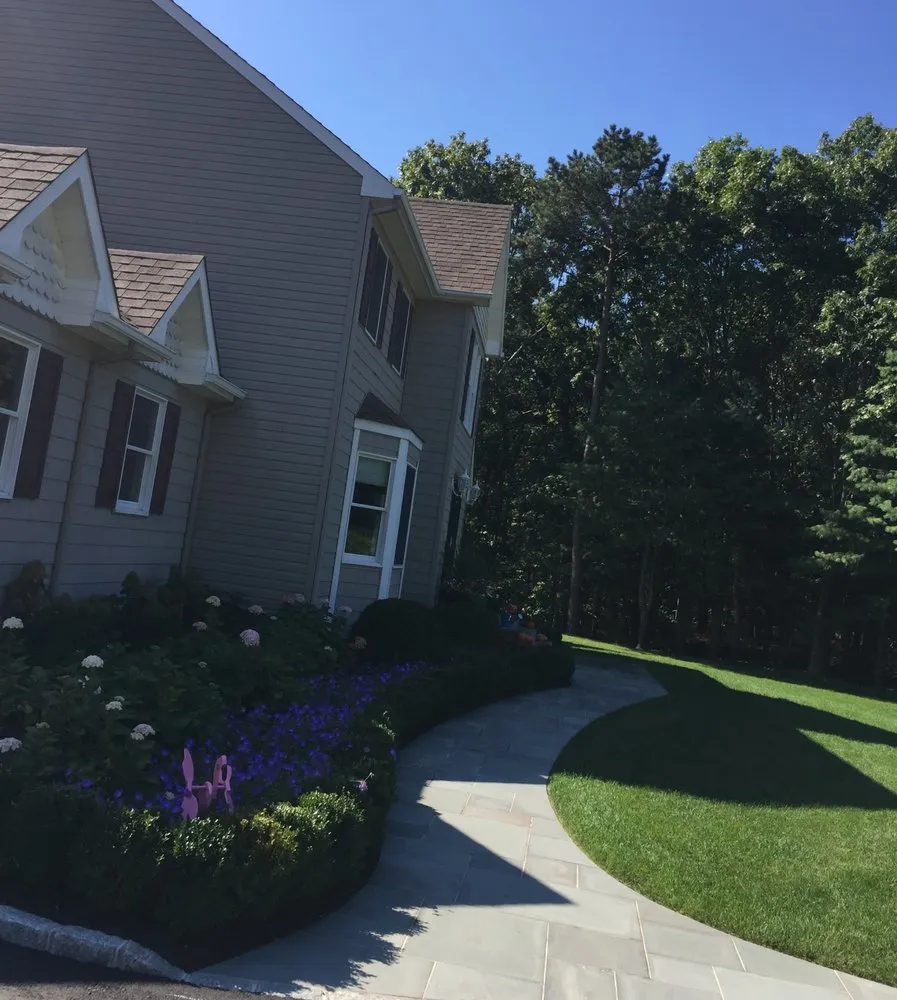 Reliable lawn mowing service in Rocky Point, NY by Castro Landscaping