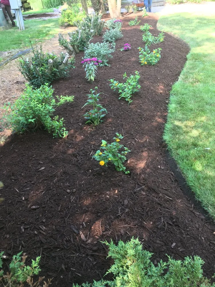 Expert garden landscaping with custom design in Harvard, IL by Castro’s Lawn Services