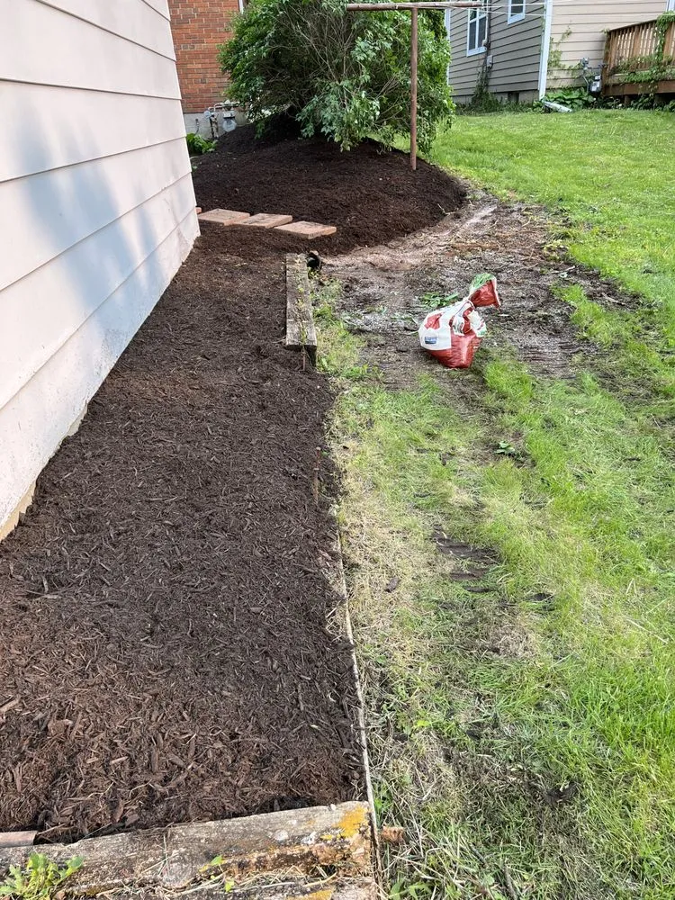 Professional garden landscaping with custom design in Harvard, IL by Castro’s Lawn Services