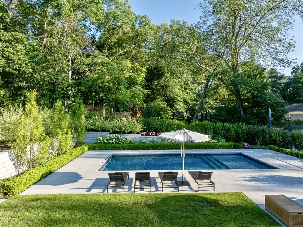 Affordable garden landscaping for residential properties in East Northport, NY by Catania Landscape and Design