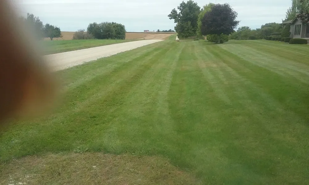 Custom lawn mowing service for homes in Waterman, IL by Caudle's Lawn Service & Landscaping