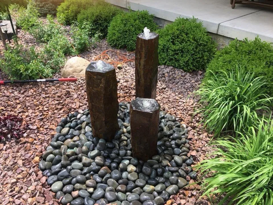 Custom garden landscaping with custom design across Lakeville, MN - Cayering Lawn, Snow & & Landscape Services