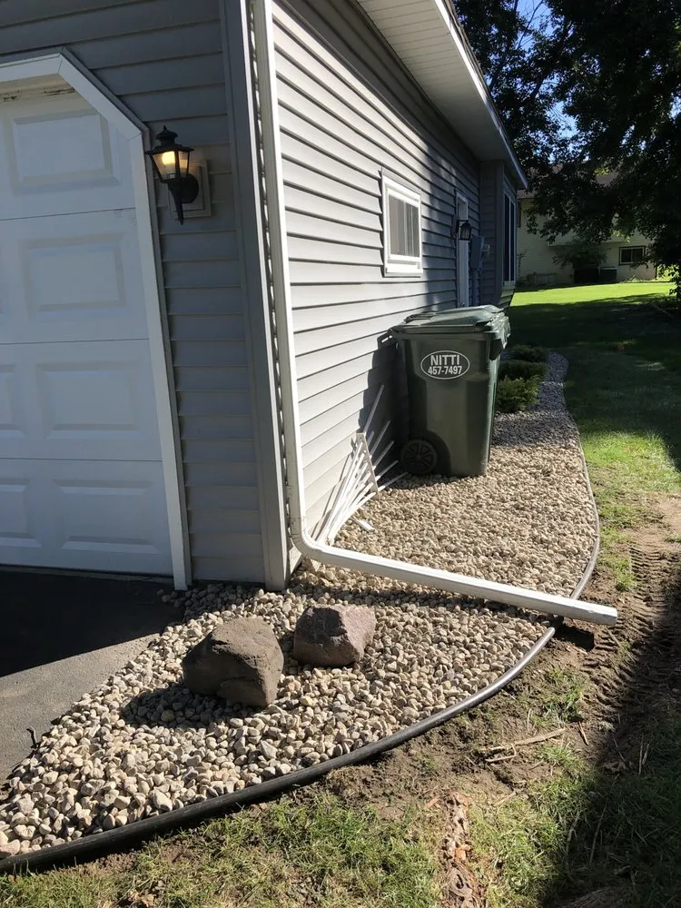 Professional lawn mowing service for year-round maintenance in Lakeville, MN by Cayering Lawn, Snow & & Landscape Services