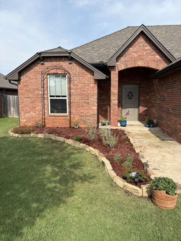 Custom landscape installation for residential properties in El Reno, OK by CB Landscaping