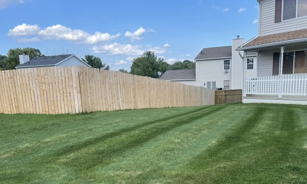 Professional yard cleanup service for homes in East Canton, OH by CB Lawn Care & Snow Removal