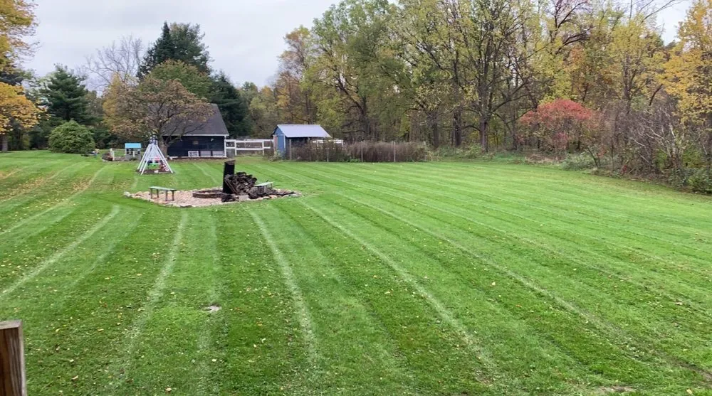 Expert lawn mowing service for residential properties in Jackson, MI by CBM Landscaping