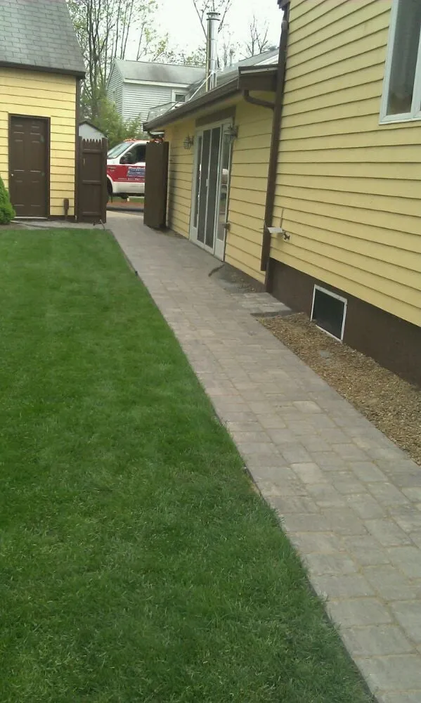 Expert lawn mowing service for beautiful yards in Holbrook, MA by C&C Landscape