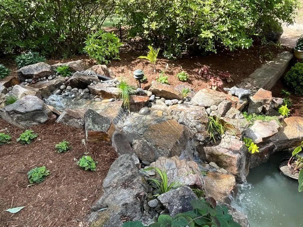 Professional lawn mowing service for homes in Lynn, MA by CDM Landscaping